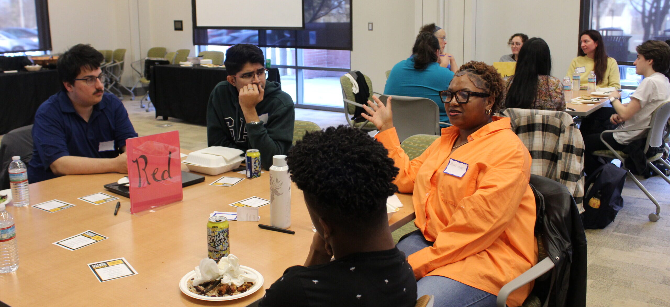 Students talk with a local change maker about how to make a difference in food justice